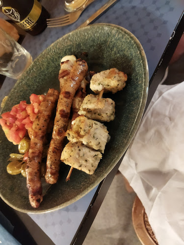 'NZOLIA Phone number