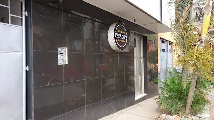 Nando's Grill-Tradicion Parrillera